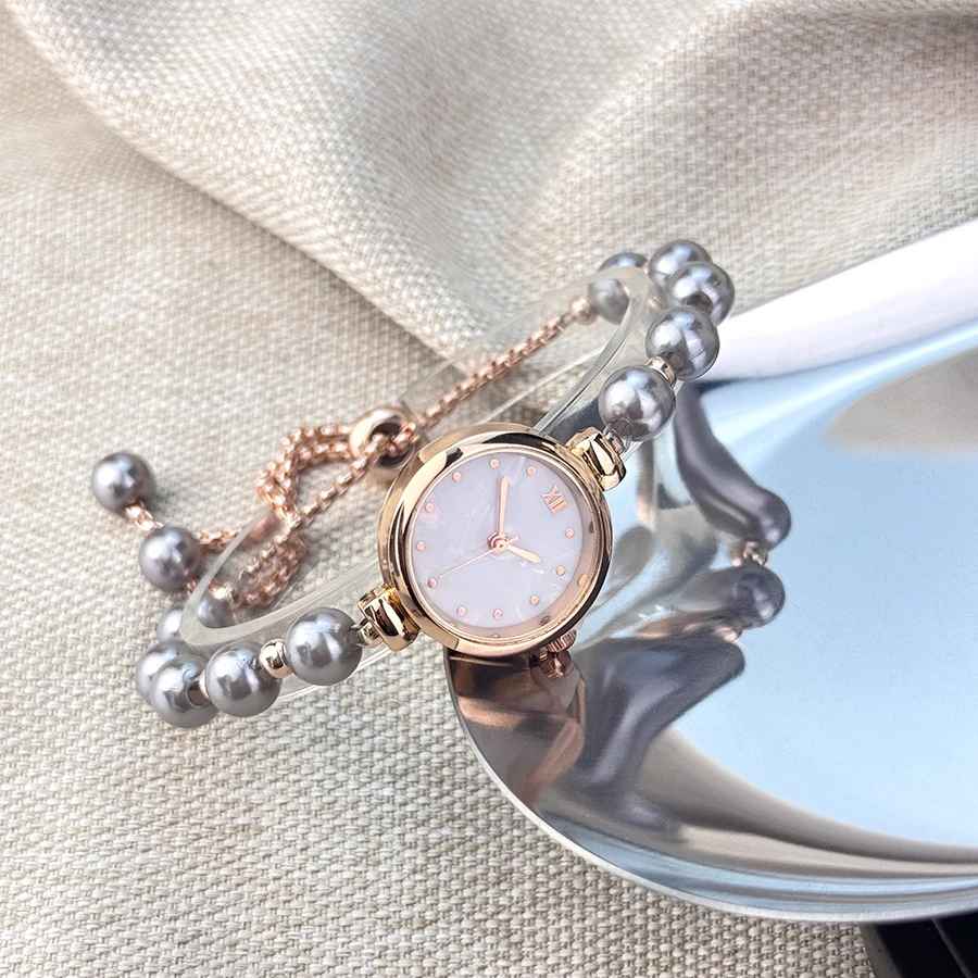 Women's beaded Pull-out bracelet Alloy Rose Gold case Premium Fritile-textured dial Elegant quartz watch suitable for banquet