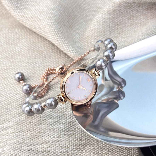 Women's beaded Pull-out bracelet Alloy Rose Gold case Premium Fritile-textured dial Elegant quartz watch suitable for banquet