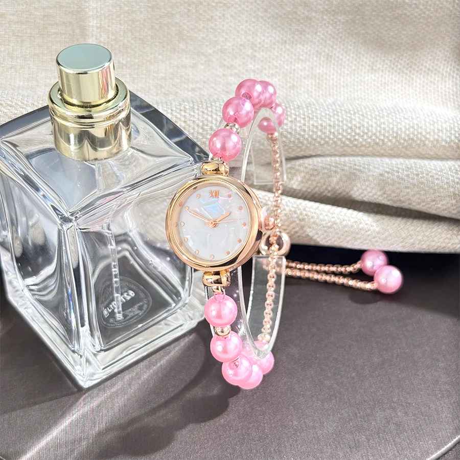 Women's beaded Pull-out bracelet Alloy Rose Gold case Premium Fritile-textured dial Elegant quartz watch suitable for banquet