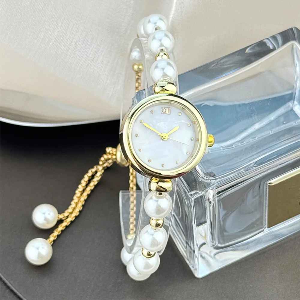 Women's beaded Pull-out bracelet Alloy Rose Gold case Premium Fritile-textured dial Elegant quartz watch suitable for banquet
