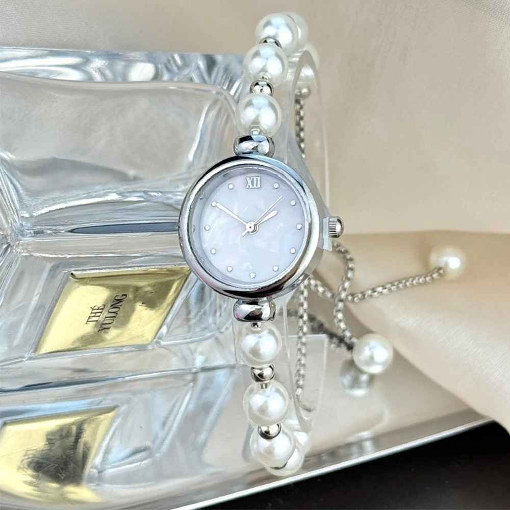 Women's beaded Pull-out bracelet Alloy Rose Gold case Premium Fritile-textured dial Elegant quartz watch suitable for banquet
