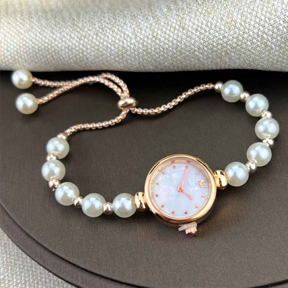 Women's beaded Pull-out bracelet Alloy Rose Gold case Premium Fritile-textured dial Elegant quartz watch suitable for banquet